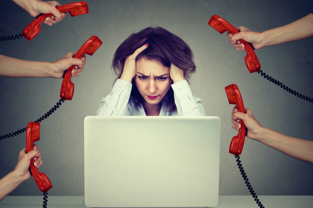 woman flustered by too many phones